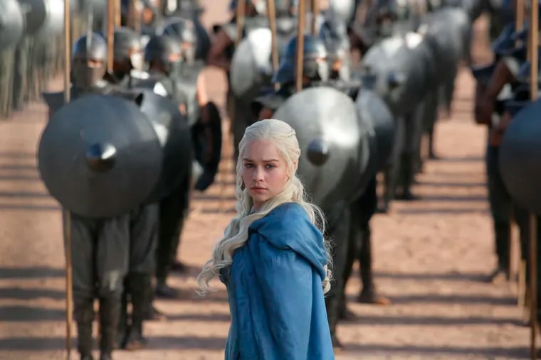 This image released by HBO shows Emilia Clarke in a scene from "Game of Thrones." The final season premieres on Sunday.