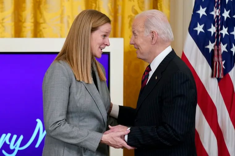 U.S. Soccer Federation president Cindy Parlow Cone (left) with President Joe Biden at the White House in March.