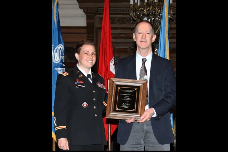 Mike Mohn (right), receives the 2019 U.S. Army Corps of Engineers Philadelphia District Outstanding Achievement Award, the highest honor among the district's annual employee recognition awards.