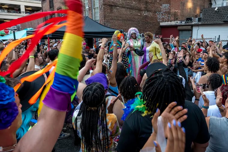 Performers Eric Jaffe (from left), Vinchelle, and Sapphira Cristal entrain the crowd as festivities continue in the Gayborhood after the Philadelphia Pride March in 2022, kicking off the city's 50th annual Pride celebration.