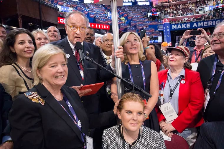 Pennsylvania delegates at the 2016 Republican National Convention in Cleveland. Former state GOP chairman Rob Gleason, center, is backing Philadelphia attorney Lawrence Tabas in a party leadership race. Tabas is expected to run against Bernie Comfort, the party's acting chair.