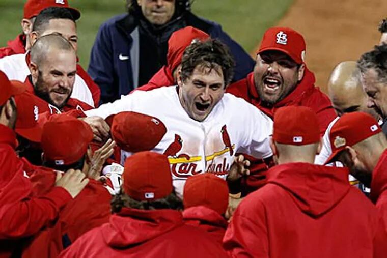 David Freese's walk-off home run in the the 10th inning forced a Game 7 in the World Series. (Eric Gay/AP)