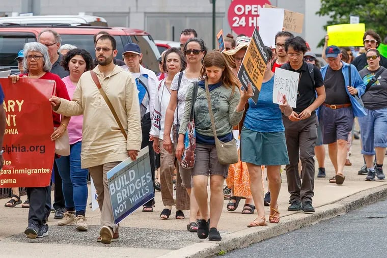 On Monday, June 24, 2019, a line of protesters circle the block of ICE Headquarters, on 8th Street, to protest the Trump administration's plans for mass deportations of illegal immigrants.