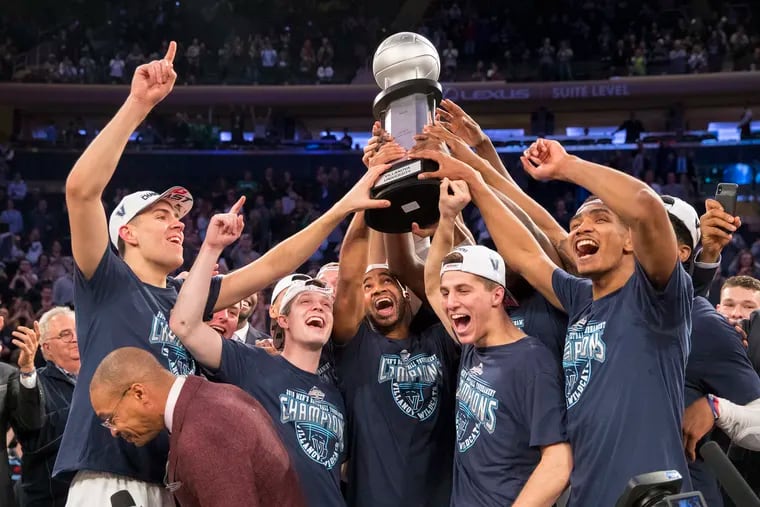 Villanova holds up their third consecutive Big East Trophy after defeating Seton Hall during the Big East Tournament Championship on March 16, 2019.    