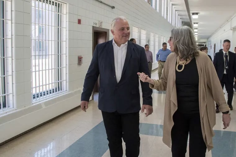 Marirosa Lamas (right), 50, superintendent of the State Correctional Institution- Chester, gives her counterpart from Halden Prison in Norway, Warden Are Hoidal, 58, a tour.