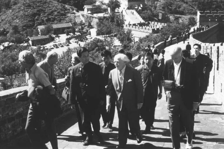 At the Great Wall in 1973, when Philadelphia's was the first U.S. orchestra to play for a Mao Tse-tung era Chinese audience, were music director Eugene Ormandy (center) and board chief C. Wanton Balis (right).