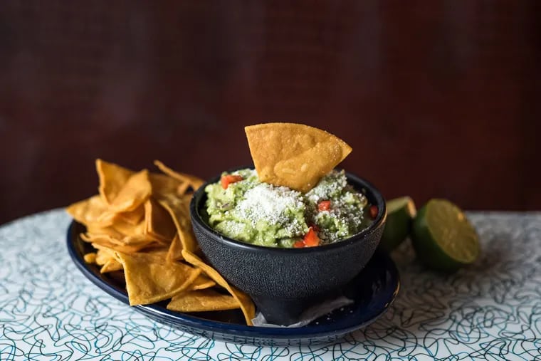 Grab guacamole to-go and an array of restaurants throughout the region. Pictured is Cafe Ynez's classic guac, mixed with red bell pepper, onion, jalapeno, cilantro, and lime.