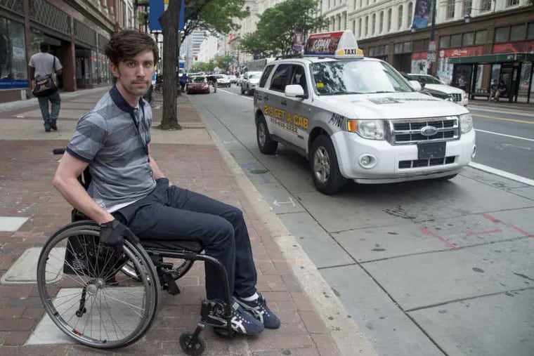 Liam Dougherty, 27, has a neurological condition called Friederich Ataxia. He is an activist trying to get more wheelchair access vehicles (WAV) taxis on the streets of Philadelphia since regular taxis, like the one here, cannot accommodate him.