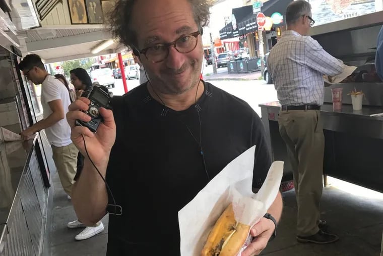 Composer Tod Machover at Pat’s King of Steaks, where he sampled the sound of sizzling cheesesteaks for his new piece, “Philadelphia Voices.”