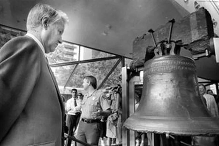 Boris Yeltsin views the Liberty Bell during a visit to Philadelphia in September 1989. Seeking to view U.S. democracy up close, he traveled the country, including a visit to the White House.