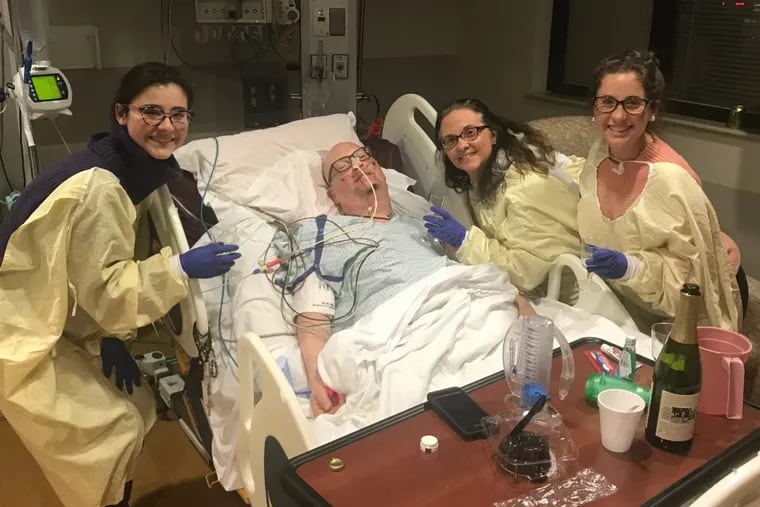 The Nappi family at the Medical Intensive Care Unit at Penn Presbyterian Medical Center. He no longer needed a breathing tube, but still had a feeding tube. From left to right, Alexandra (Allie), Paul, Leisa and Isabella (Bella) Nappi.