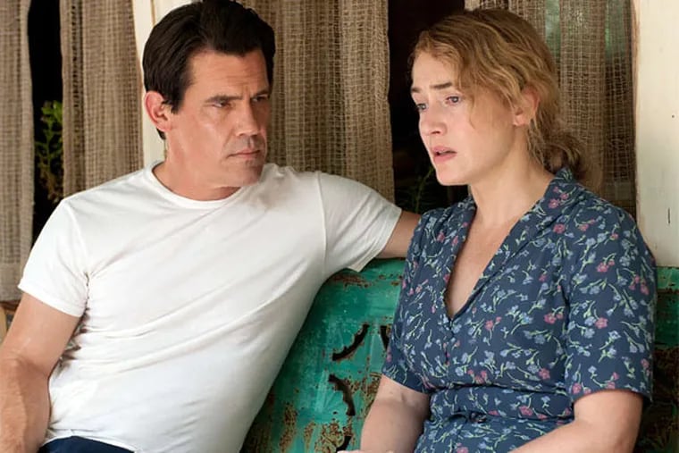 Josh Brolin and Kate Winslet in the strange, strangely compelling &quot;Labor Day,&quot; about a shut-in, her son, and an escaped convict.