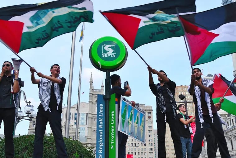 Palestine protesters gathered across the street from LOVE park at Philadelphia's Municipal Services Building on Wednesday, July 23, 2014.