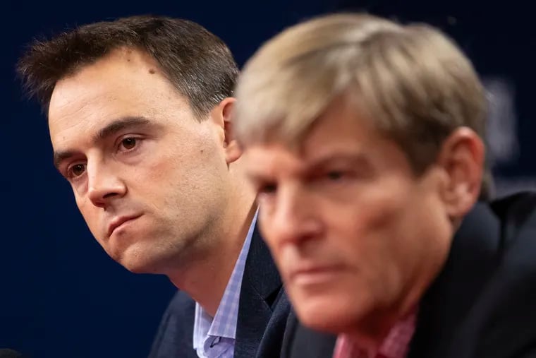 After five non-winning seasons at the helm, Matt Klentak (left) was demoted from the general manager job by Phillies managing partner John Middleton (right).