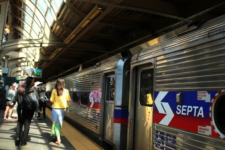 A SEPTA Trenton Line train pulls into 30th Street Station, Sunday, June 15, 2014. (DAVID SWANSON/Staff Photographer)