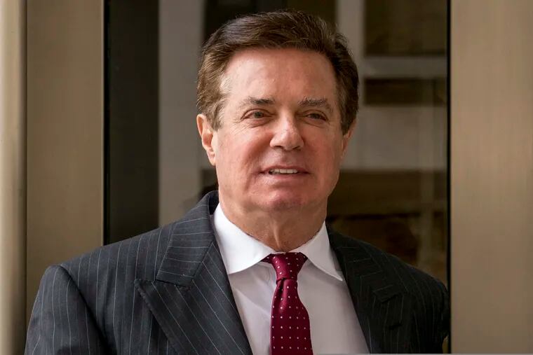FILE - In this April 4, 2018, file photo, Paul Manafort, President Donald Trump's former campaign chairman, leaves the federal courthouse in Washington. Newly released documents show a Trump campaign official told the FBI that during the 2016 presidential race the campaign's chairman, Manafort, pushed the idea that Ukraine, not Russia, was behind the hack of the Democratic National Committee's servers.