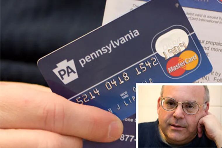 Steve Lippe of West Philadelphia has been laid off twice in the last four years. He recently realized that the state's unemployment debit card he was issued has some strings attached in the form of usage charges. (Ed Hille / Staff Photographer)