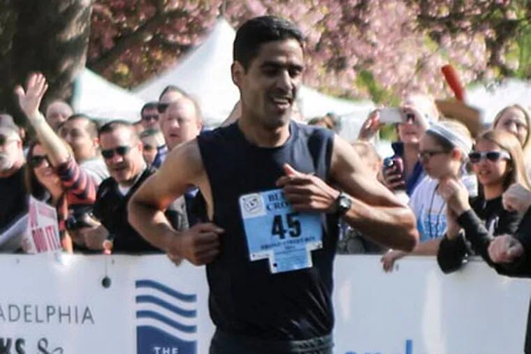 Morocco's Mourad Marofit won the 2014 Broad Street Run with a time of 47:07. (Steph Aaronson / Philly.com)