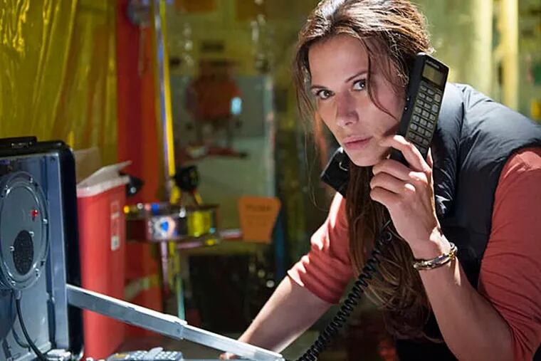Rhona Mitra is paleomicrobiologist Rachel Scott searching for the cure to a deadly global virus in "The Last Ship" a 10-part mini-series that begins Sunday on TNT.
