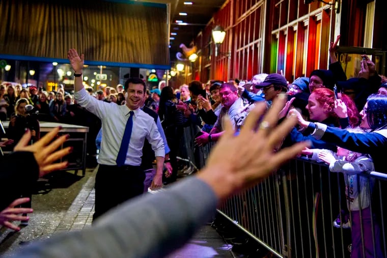 Democratic presidential candidate Mayor Pete Buttigieg leaves the stage after making his first trip to Philadelphia for a grassroots rally next to Reading Terminal Market.