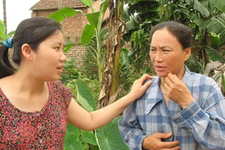 Le Thi Minh pays a rare visit to her mother, Pham Thi Mau, who sent Minhto Hanoi when she was 13 because the land could not support them both. Minh now prefers her job in a crafts store there to life in the village.