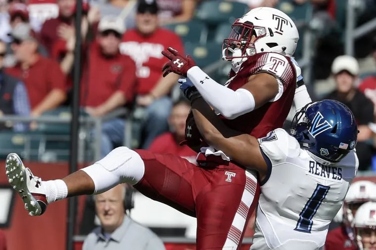 Temple wide receiver Keith Kirkwood catches the football against Villanova defensive back Malik Reaves on , Sept. 9.