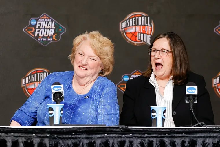 Theresa Grentz (left) and Marianne Stanley laughing during the Naismith Basketball Hall of Fame class of 2022 announcement in New Orleans in April.