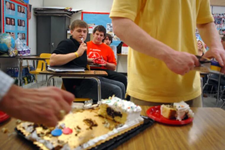 Instead of going home to sleep after his final chemo treatment, Sam (in front chair) took a cake to Haddonfield High to celebrate with his AP government class.