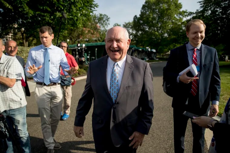 Agriculture Secretary Sonny Perdue laughs with a reporter on the North Lawn of the White House in Washington, Thursday, May 23, 2019.(AP Photo/Andrew Harnik)