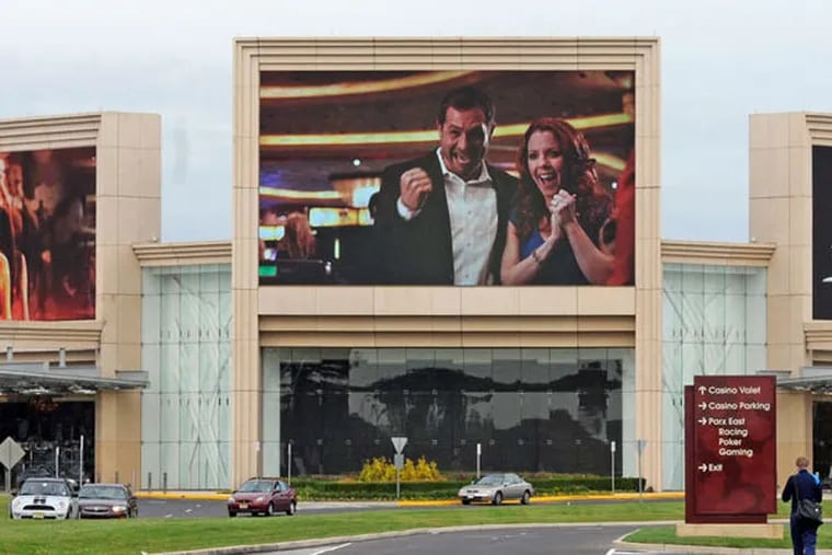 The owners of the Parx Casino in Bensalem Township want to reduce their local tax burden, which could affect schools. (April Saul / Staff Photographer)