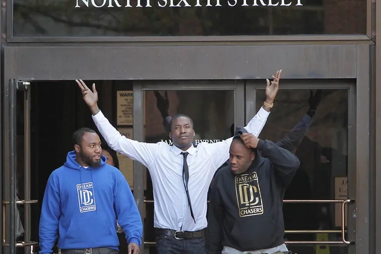 Meek Mill (center) leaves federal court up in arms after verdict.
