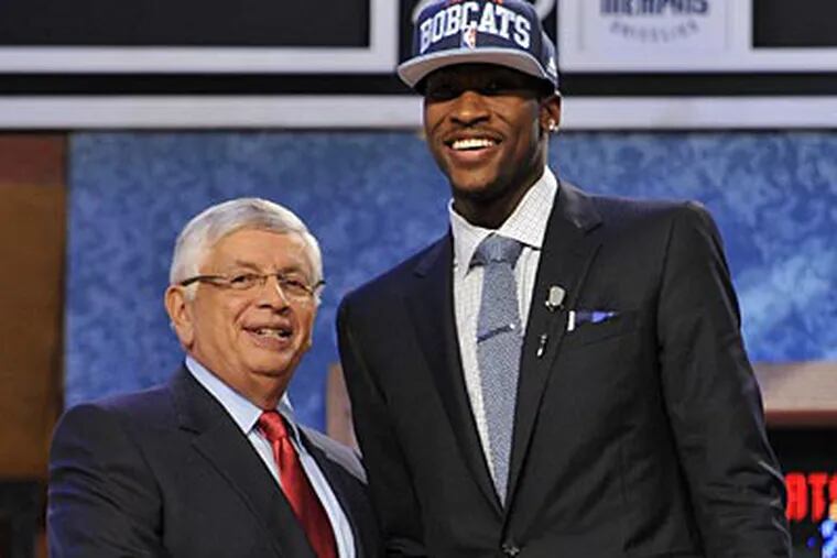 NBA Commissioner David Stern poses with the No. 2 overall pick Michael Kidd-Gilchrist. (Bill Kostroun/AP)