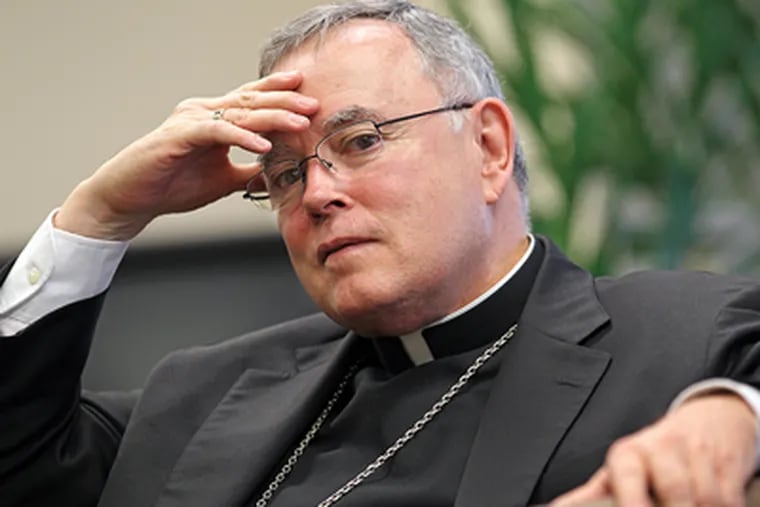 Archbishop Charles J. Chaput says he’ll wait for a report due in December before coming up with a plan for schools. ( Michael Bryant / Staff Photographer )