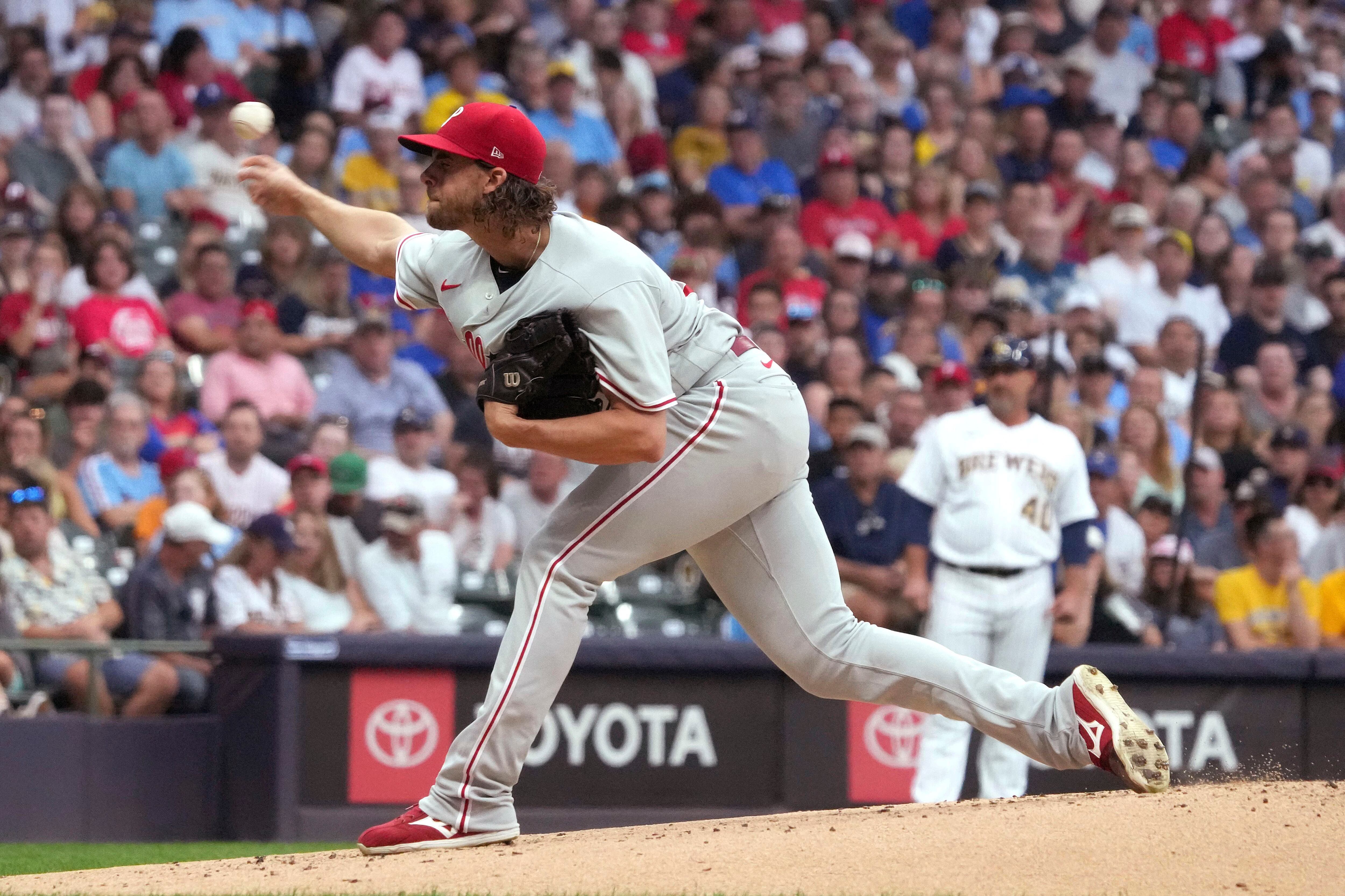 Nola shines in 1st start after All-Star break as Phillies edge Brewers