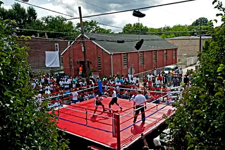 The new, yet-to-be-used boxing ring at the North Camden Community Center and a closetfull of new equipment; while Chris Williams and his Camden Boxing Academy kids, who used to use the North Camden location, have been traveling to Pennsauken's R & B gym since 201. Here, in this 2012 photo, an all-day event tournament sponsored by the Camden Boxing Academy to promote peace in the city.   ( APRIL SAUL / Staff )