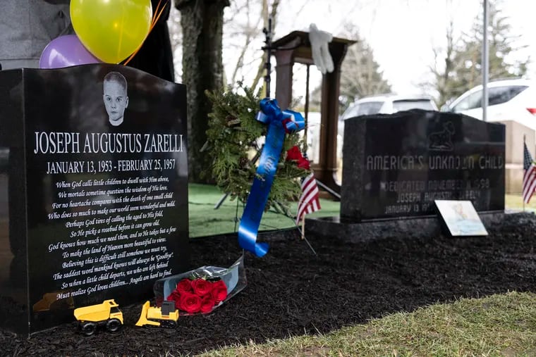 The grave stone with Joseph Zarelli's name is shown after its unveiling at Ivy Hill Cemetery on Friday, which would have been the boy's 70th birthday.