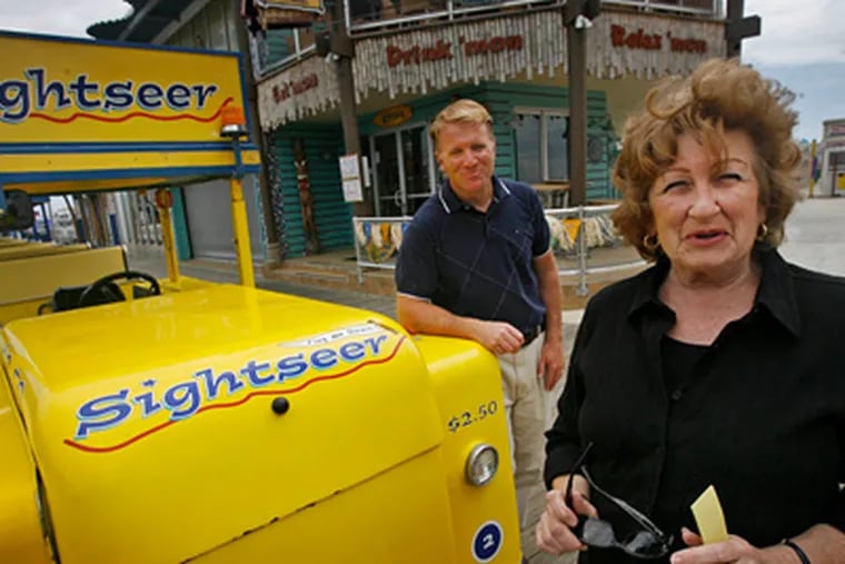 Pat Rosenello, owner of Boardwalk Sightseer, along the Boardwalk in Wildwood, with Floss Stingel, the "Voice of the Tram Car." (Alejandro A. Alvarez / Staff Photographer)