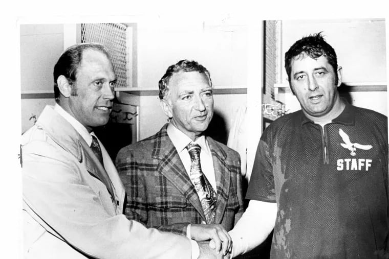 Eagles general manager Pete Retzlaff (left) and coach Ed Khayat (right) pose with owner Leonard Tose in 1971.