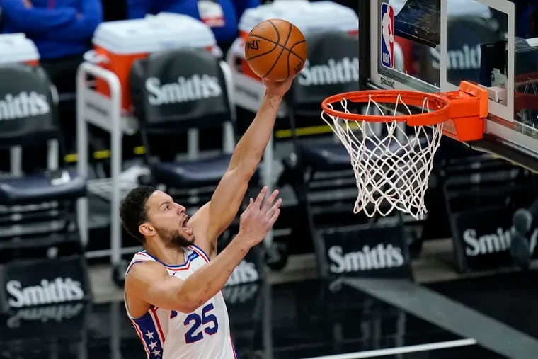 76ers guard Ben Simmons goes to the basket during the first quarter in Utah.