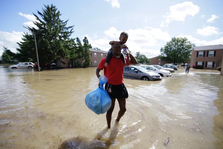 File: Flooding at 82nd Street and Lindbergh Avenue in Southwest Philadelphia in August 2020.  A new climate assessment by Pennsylvania says average annual temperatures will rise by rise 5.9 degrees by 2050, along with more flooding.