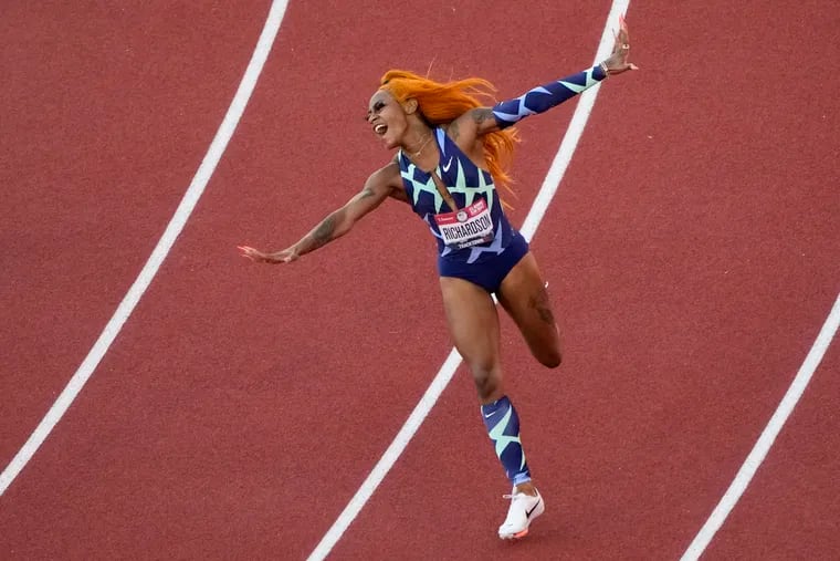 Sha'Carri Richardson celebrates after winning the women's 100-meter run at the U.S. Olympic Track and Field Trials last month. She was later suspended a month after testing positive for marijuana.