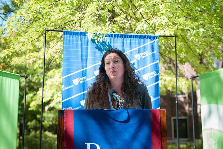 Melissa Wilde speaks on “How much does a pope matter?” at Penn. Her talk, scheduled for a minute, went over by about 10 seconds. (TRACIE VAN AUKEN/For The Inquirer)