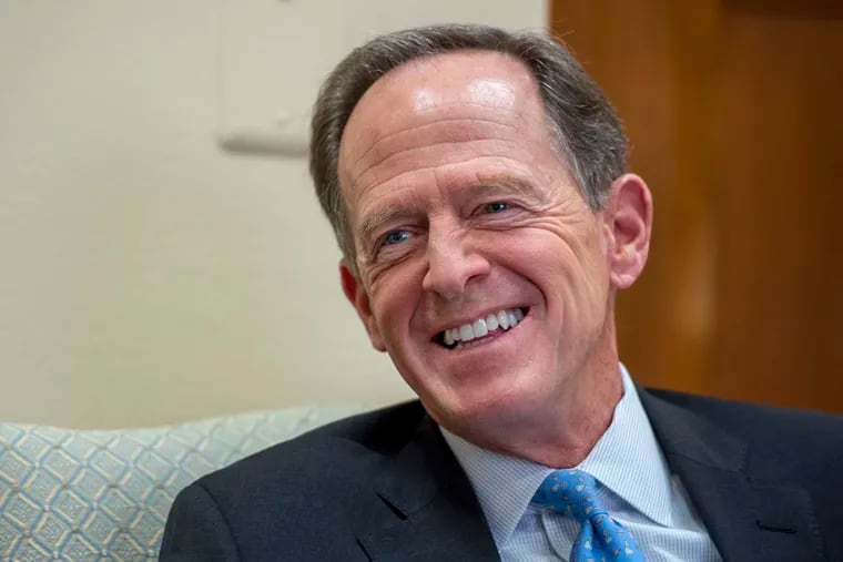 Sen. Pat Toomey (R., Pa.) speaks to The Inquirer in his office near the Capitol on Nov. 17.