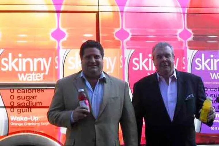Skinny Water founders Michael Salaman (left) and Donald McDonald said in 2010 that they were trying to boost sales and raise capital. &quot;We're two guys from Philadelphia who are taking on the Cokes and Pepsis of the world,&quot; McDonald said. (File photo)