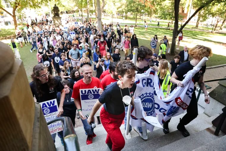 Hilah Kohen, a doctoral student in comparative literature, and hundreds of supporters marched into College Hall during a rally at the University of Pennsylvania on Oct. 4. The Graduate Employees Together University of Pennsylvania, also known as GET-UP, is working to form a union of graduate student workers.