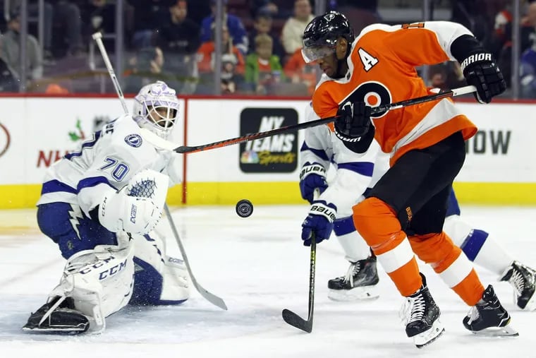 Tampa Bay Lightning goalie Louis Domingue, stops a shot taken by the Flyers' Wayne Simmonds, during the second period Saturday at the Wells Fargo Center.