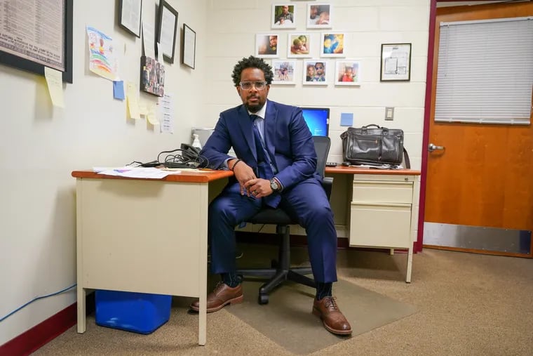 Rann Miller poses for a photograph in his office at Camden Promise Charter School in Camden on Oct. 27, 2021. Miller is the head of diversity, equity, and inclusion for his Camden charter school district, and is reshaping the curriculum to include important perspectives from the BIPOC community once left out.