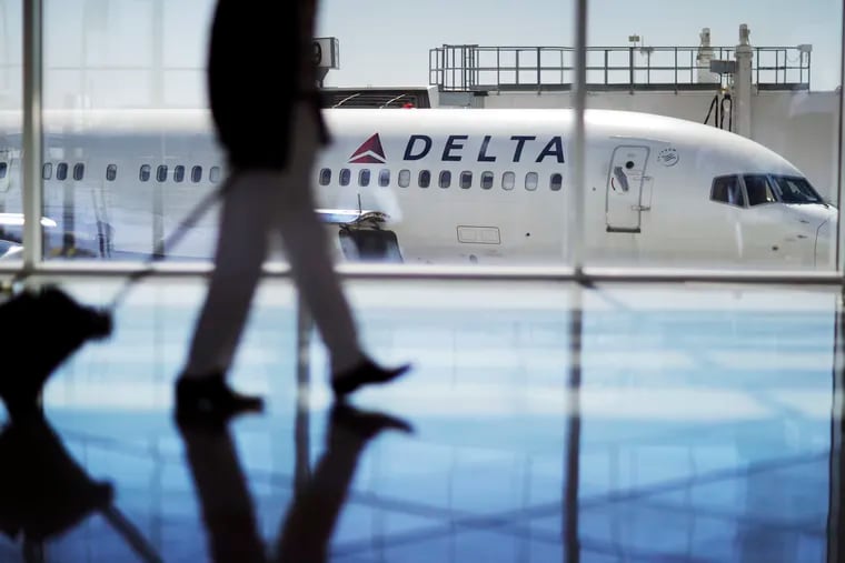 A Delta airplane sits at a gate at Hartsfield-Jackson Atlanta International Airport in Atlanta. Delta was ranked as one of the top WiFi airlines in the world.