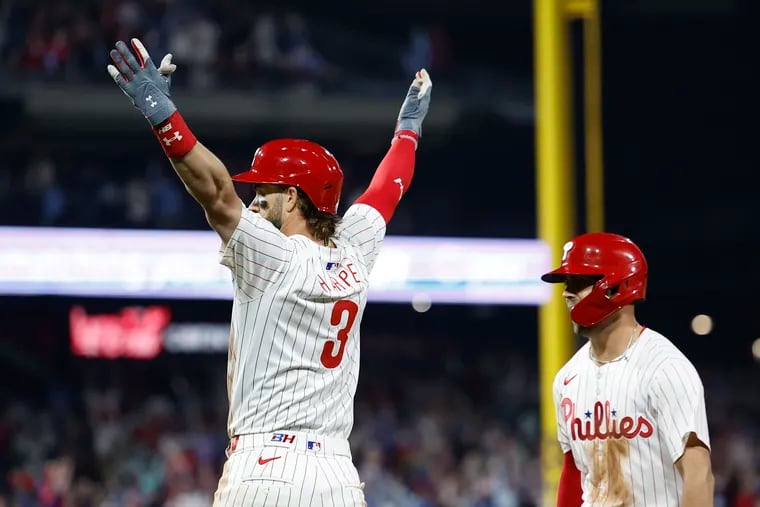 Bryce Harper hit a walk-off sacrifice fly in the 10th inning to secure the 4-3 victory.