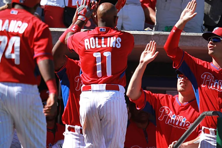 Phillies' Jimmy Rollins hits a three run homer in the third inning. (David Swanson/Staff Photographer)